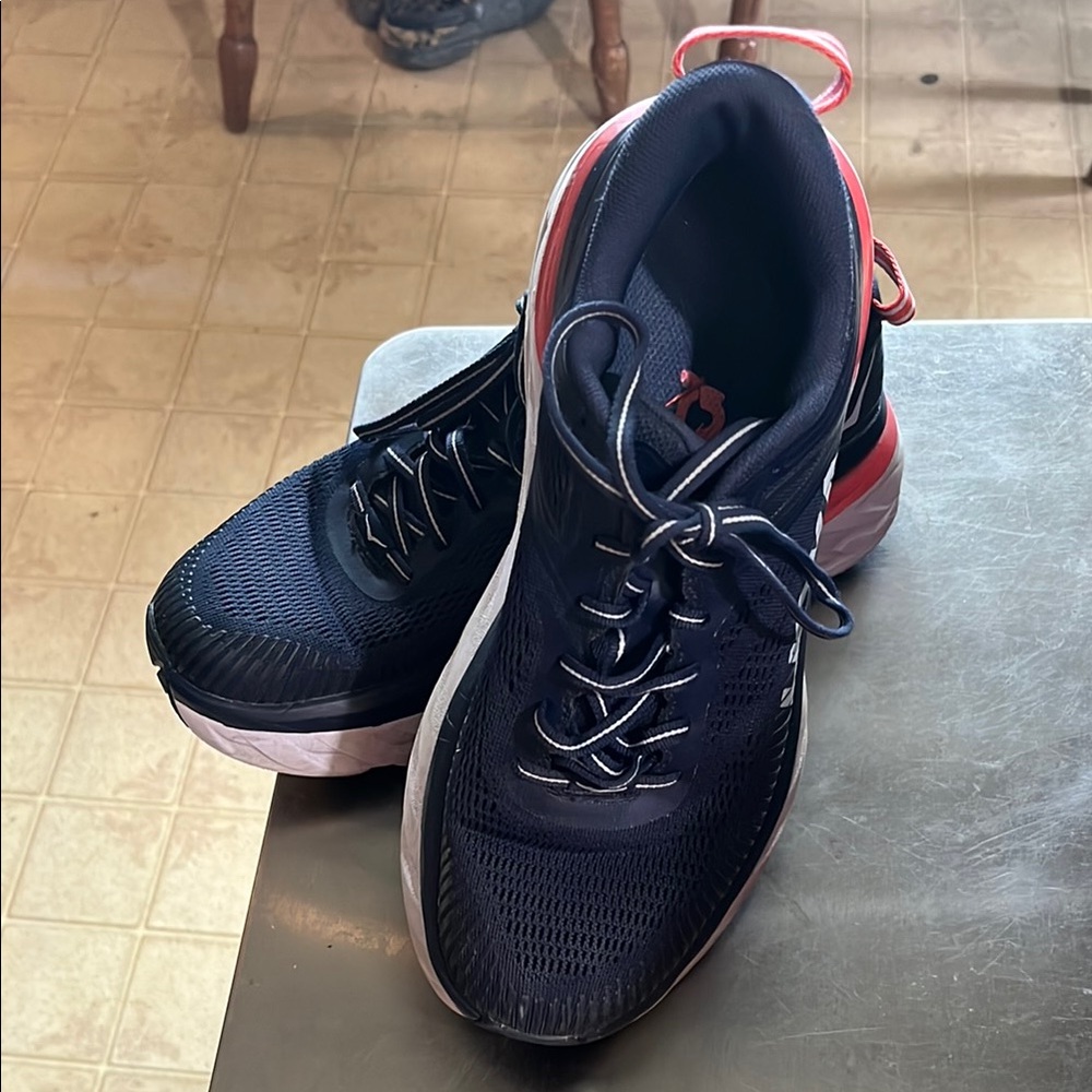 Hoka One One Bondi Black and Orange sneakers Sleek Design. Size 8